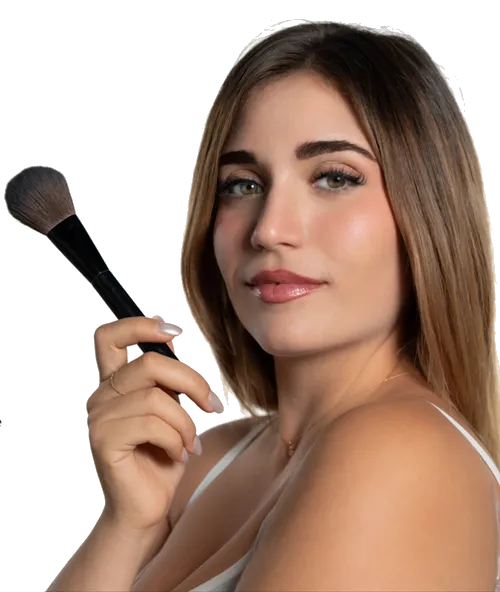 Elena Cammarano holding a makeup brush